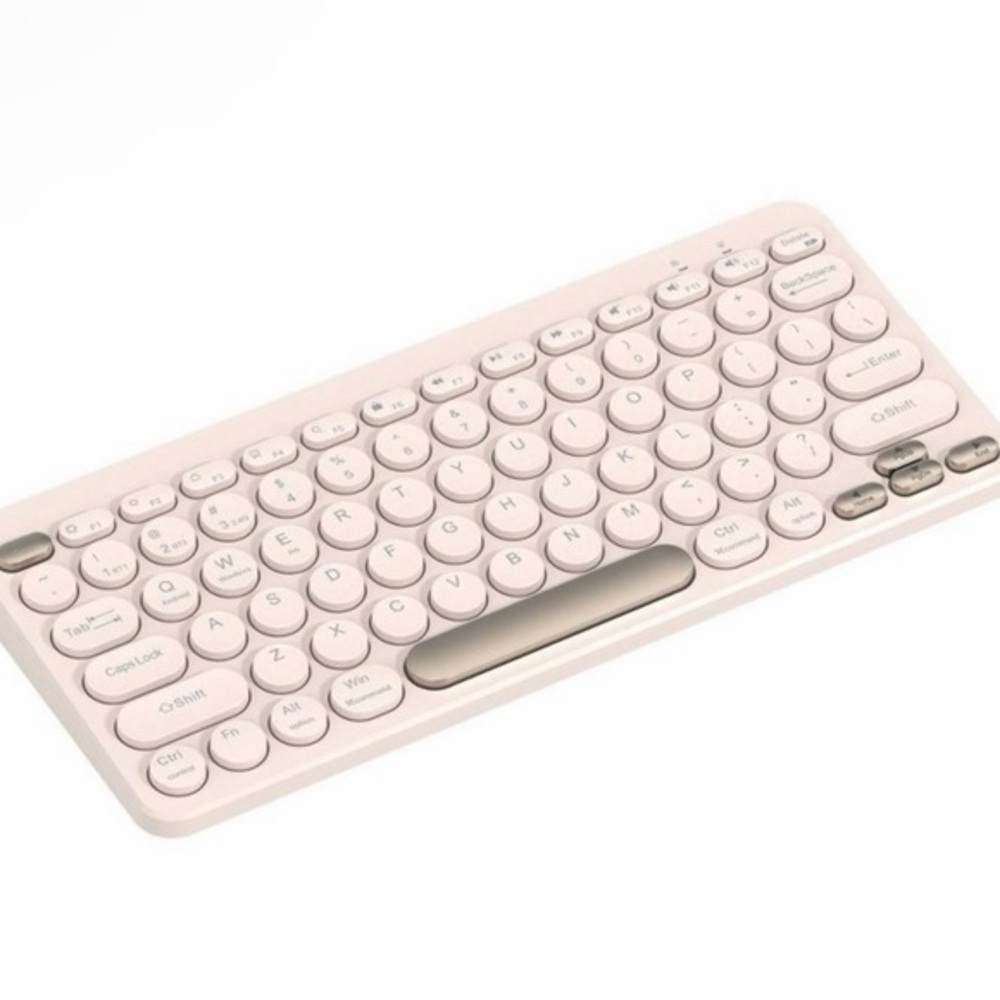 North Compact Round Key Wireless Keyboard
- Beige NIB (box damaged)